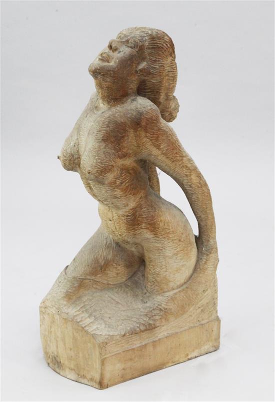 Cyril Saunders Spackman (1887-1963). A 20th century wood carving of a kneeling nude woman, 31.5in.